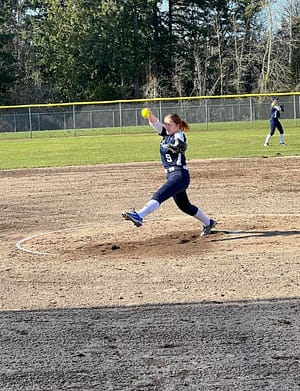 Masdison Ahlquist pitching at fastpitch game
