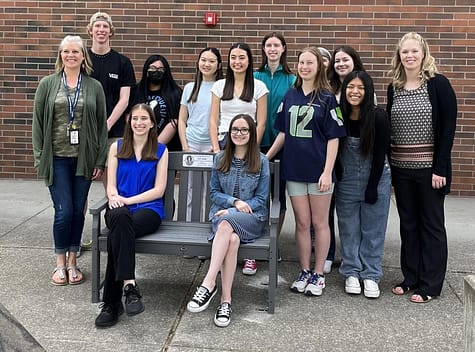 RHS environmental club in front of their new bench.