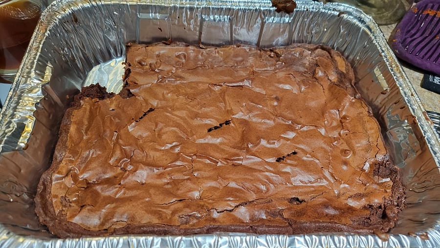 Brownies in a tin pan fresh out of the oven.