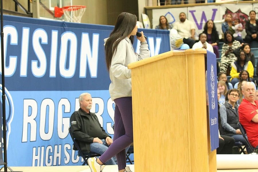 Sara Sandhu speaking at the Decion Day assembly.